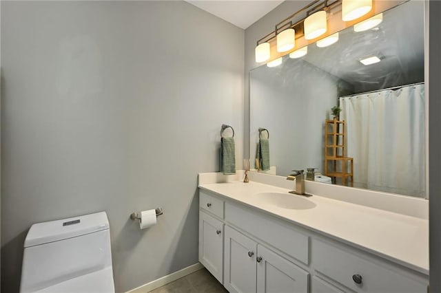 16059 Fontana St Unit 205, Overland Park, KS 66085 - full bath featuring baseboards, a shower with shower curtain, toilet, and vanity