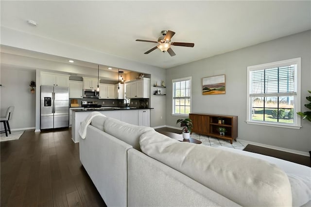 16059 Fontana St Unit 205, Overland Park, KS 66085 - living area with baseboards, dark wood-type flooring, ceiling fan, and recessed lighting