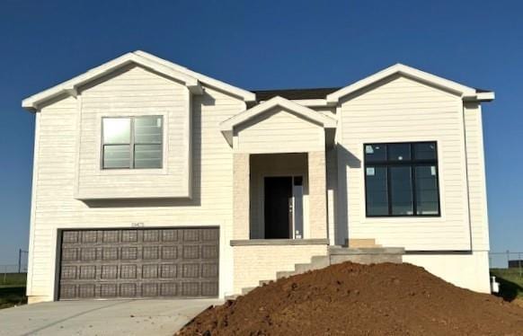 19475 S Amherst St, Gardner, KS 66030 - view of front of property with an attached garage and driveway