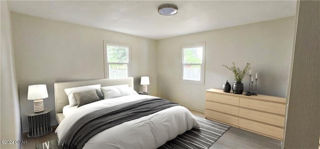 bedroom featuring wood finished floors