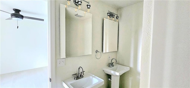 bathroom featuring a sink and a ceiling fan
