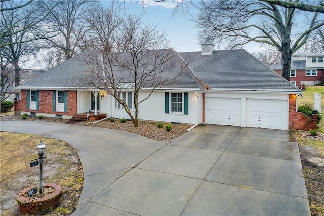 single story home featuring a garage, a shingled roof, brick siding, driveway, and crawl space