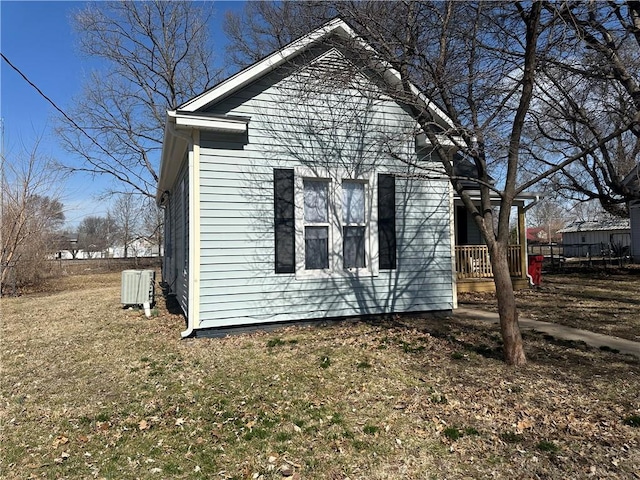 view of home's exterior with a yard