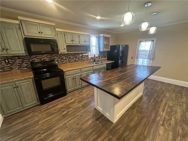 kitchen with dark wood-style floors, ornamental molding, a sink, black appliances, and backsplash