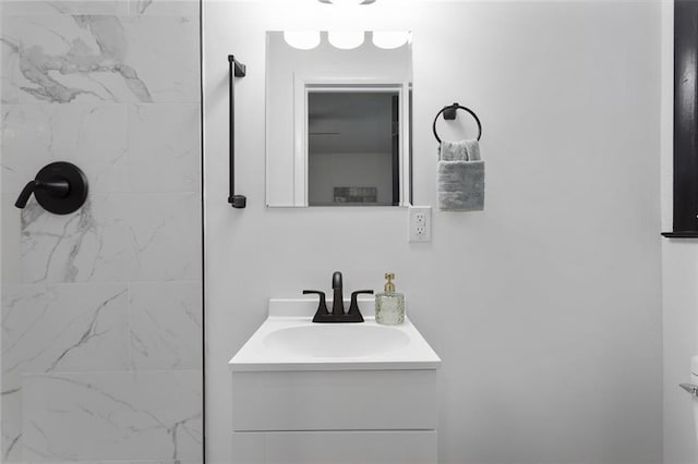 bathroom with vanity and walk in shower