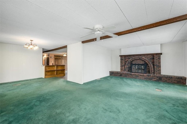 24722 Tonganoxie Dr, Leavenworth, KS 66048 - unfurnished living room featuring carpet flooring, ceiling fan with notable chandelier, and a fireplace