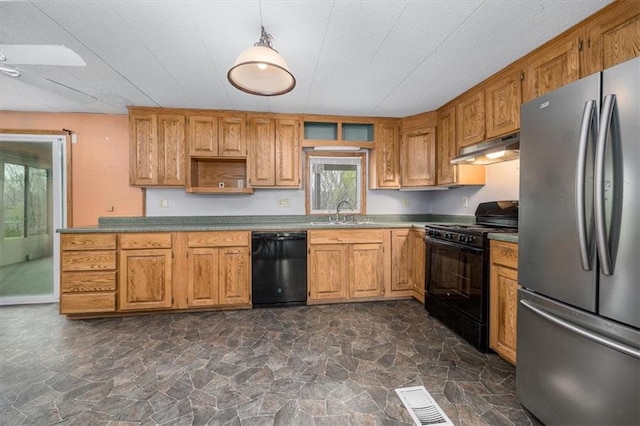 24722 Tonganoxie Dr, Leavenworth, KS 66048 - kitchen with stone finish floor, visible vents, a sink, black appliances, and under cabinet range hood