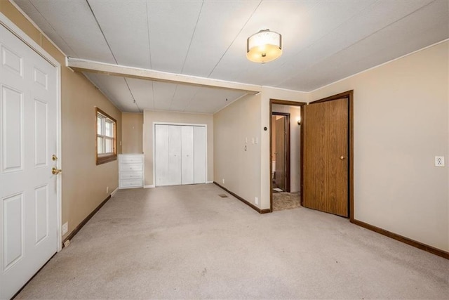 24722 Tonganoxie Dr, Leavenworth, KS 66048 - interior space with carpet flooring, baseboards, and a closet