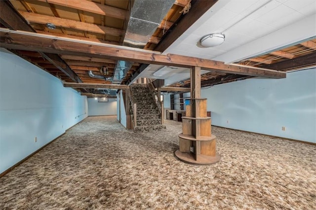 24722 Tonganoxie Dr, Leavenworth, KS 66048 - finished below grade area with stairway, baseboards, and carpet flooring