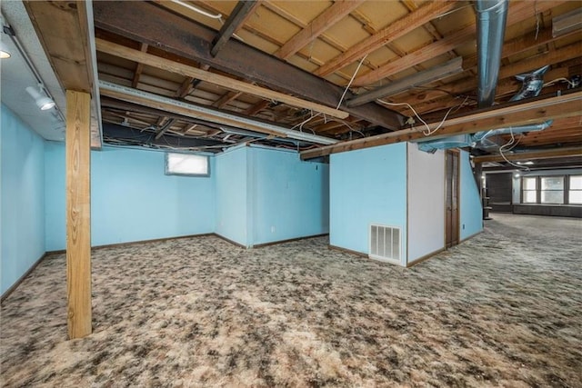 24722 Tonganoxie Dr, Leavenworth, KS 66048 - basement featuring carpet floors and visible vents