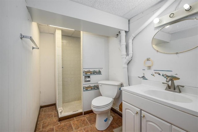 24722 Tonganoxie Dr, Leavenworth, KS 66048 - bathroom with toilet, a drop ceiling, tiled shower, and vanity