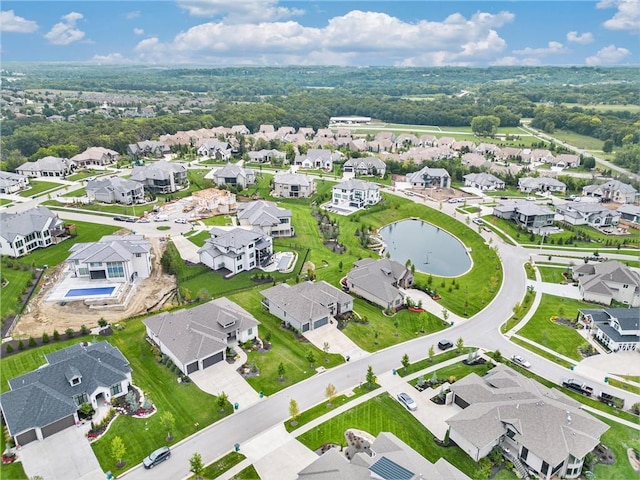 birds eye view of property with a residential view