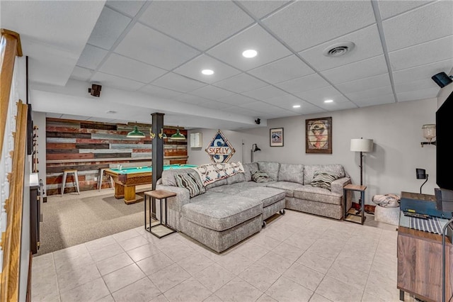 living room featuring a paneled ceiling, light tile patterned floors, visible vents, and recessed lighting