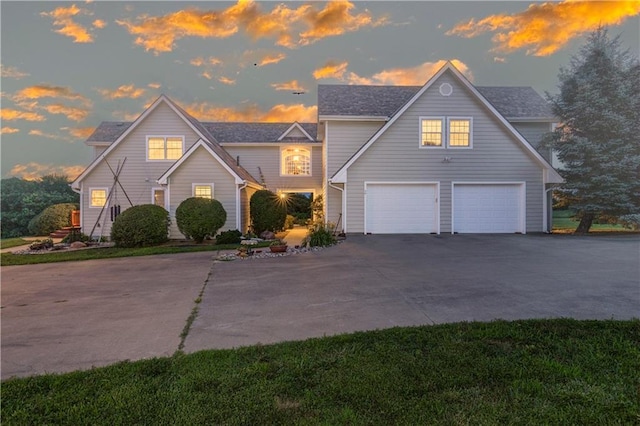 view of front facade with a garage and driveway