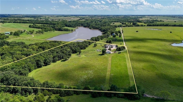 aerial view featuring a rural view and a water view