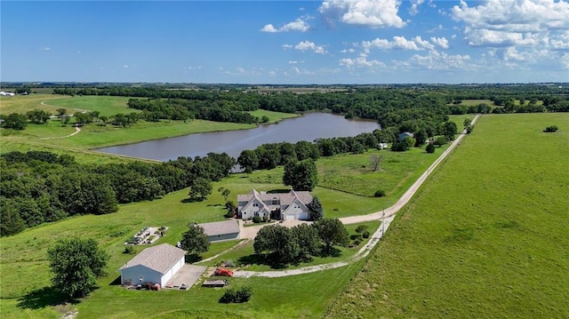 birds eye view of property with a water view and a rural view