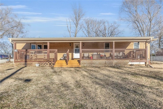 ranch-style home featuring brick siding