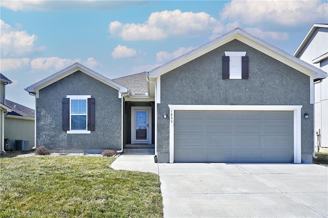 ranch-style house with stucco siding, concrete driveway, a front yard, a garage, and central AC unit