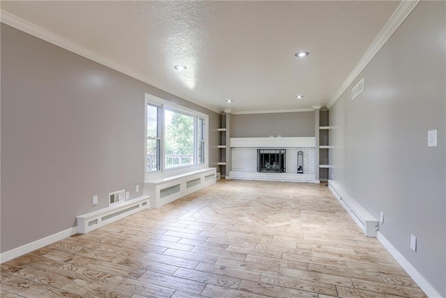 unfurnished living room with ornamental molding, light wood-type flooring, and visible vents