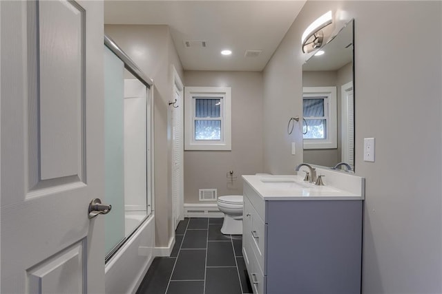 full bath featuring toilet, tile patterned flooring, visible vents, and vanity