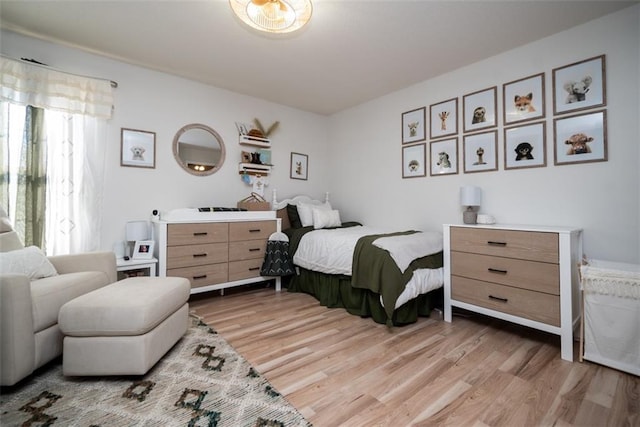 bedroom featuring wood finished floors