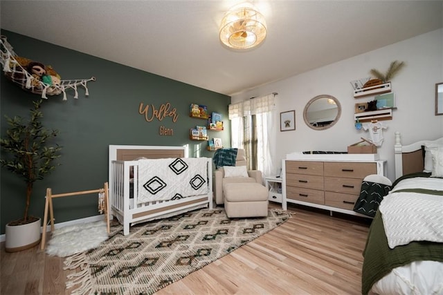 bedroom featuring wood finished floors