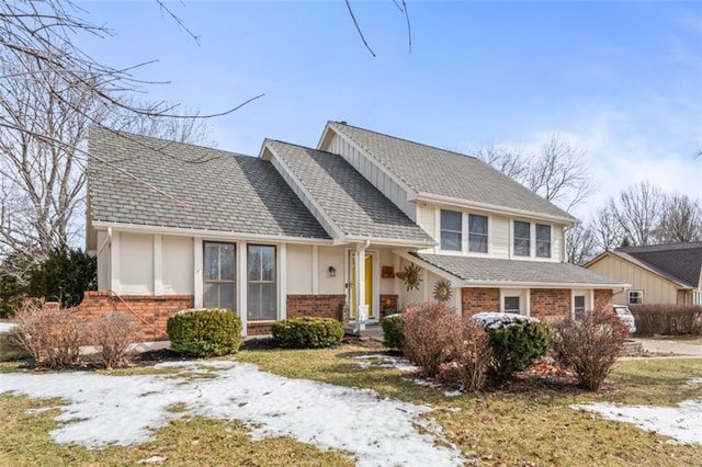 view of front of home with brick siding