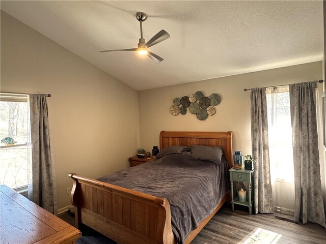 170 Paddle Boat Ln, Linn Valley, KS 66040 - bedroom featuring ceiling fan, a textured ceiling, lofted ceiling, and wood finished floors