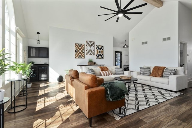 living room with high vaulted ceiling, beam ceiling, visible vents, and wood finished floors