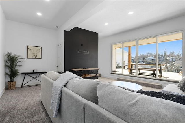 living area featuring recessed lighting, carpet flooring, visible vents, and baseboards