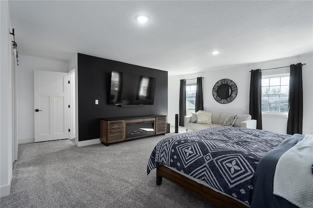 bedroom with carpet floors, baseboards, and recessed lighting