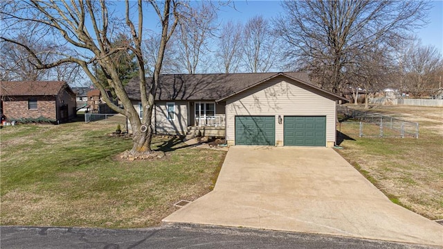 ranch-style house with a garage, concrete driveway, a front yard, and fence