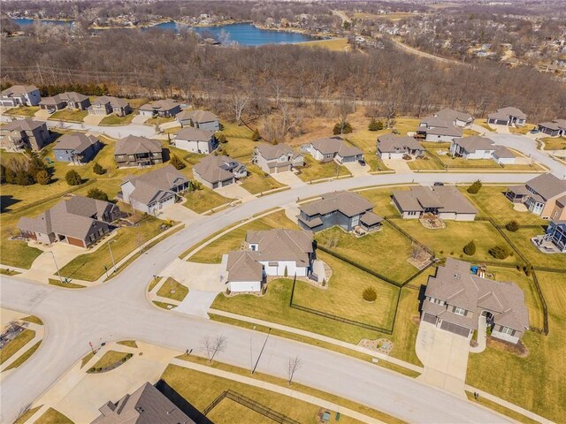4510 NW 70th Ter, Kansas City, MO 64151 - bird's eye view with a residential view and a water view