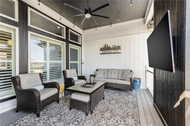 4510 NW 70th Ter, Kansas City, MO 64151 - living area with a ceiling fan and wood-type flooring