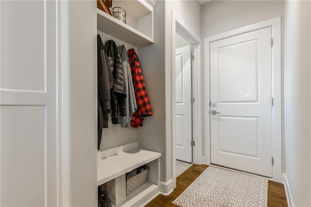 4510 NW 70th Ter, Kansas City, MO 64151 - mudroom with baseboards and dark wood finished floors