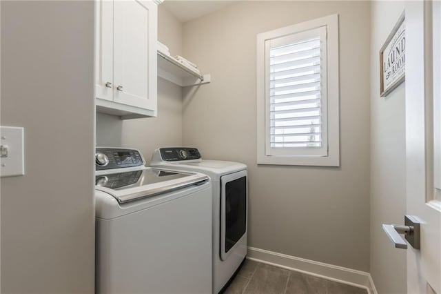 4510 NW 70th Ter, Kansas City, MO 64151 - washroom featuring washing machine and dryer, cabinet space, and baseboards