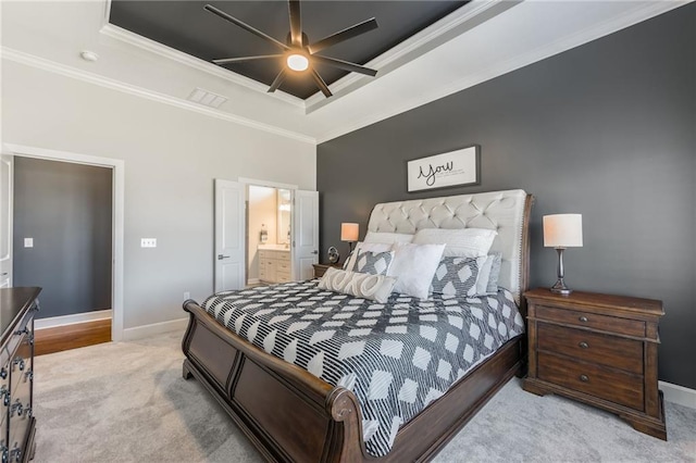 4510 NW 70th Ter, Kansas City, MO 64151 - carpeted bedroom featuring ceiling fan, baseboards, a tray ceiling, and ornamental molding
