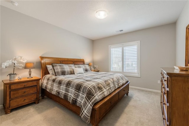 4510 NW 70th Ter, Kansas City, MO 64151 - bedroom featuring light carpet, visible vents, and baseboards