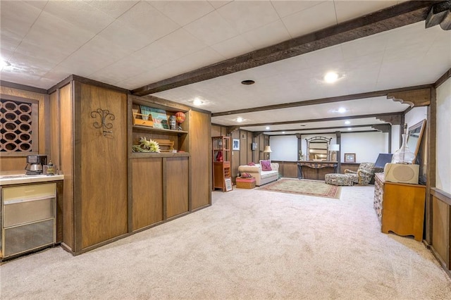 living room featuring light carpet, beam ceiling, and recessed lighting