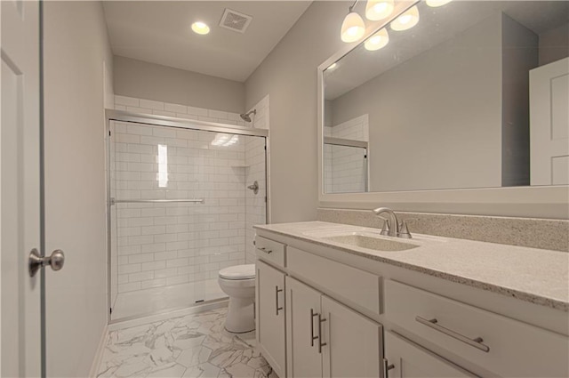 full bath featuring marble finish floor, visible vents, toilet, a tile shower, and vanity