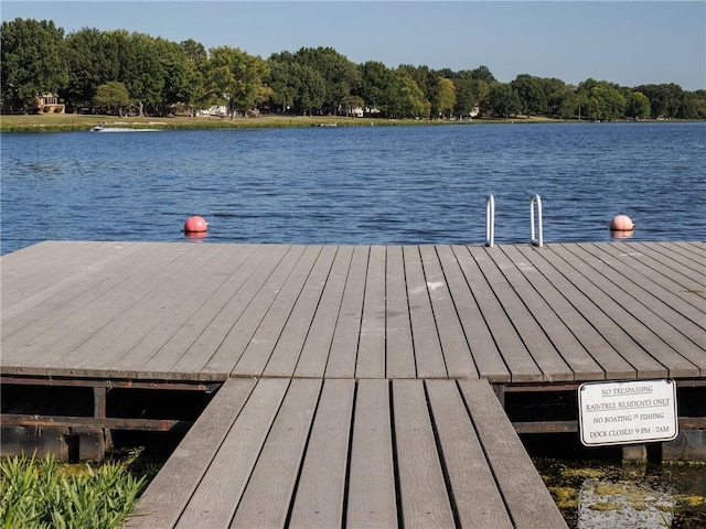 view of dock with a water view