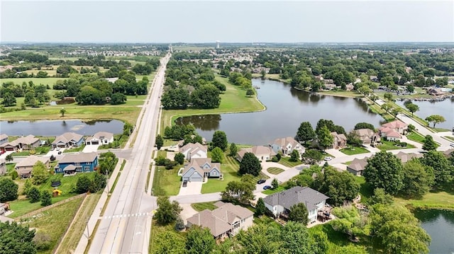 bird's eye view with a water view and a residential view