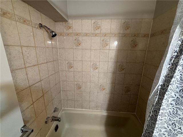 bathroom featuring shower / bath combination with curtain