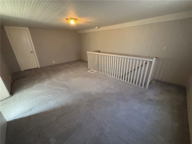 unfurnished room with carpet flooring