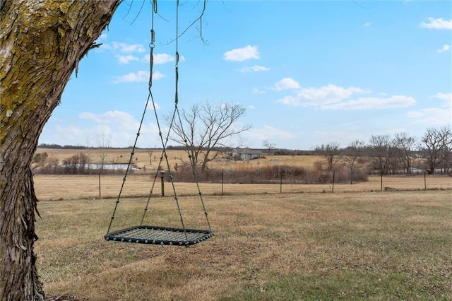 view of yard with a rural view