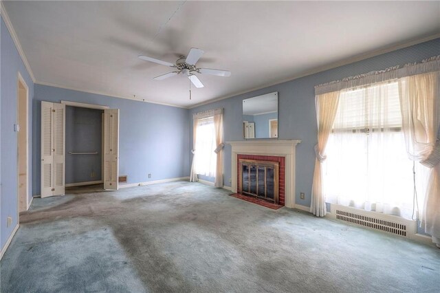 8715 High Dr, Leawood, KS 66206 - unfurnished living room featuring ornamental molding, a brick fireplace, ceiling fan, baseboards, and carpet floors
