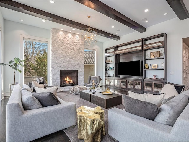 living room featuring a fireplace, dark wood finished floors, beamed ceiling, and recessed lighting