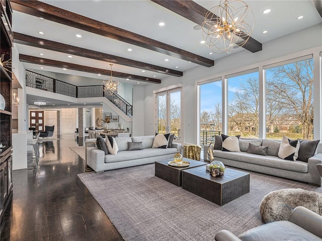 living area with a chandelier, beamed ceiling, dark wood-style floors, and recessed lighting