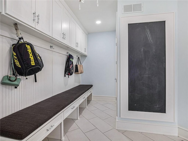 mudroom featuring light tile patterned floors, baseboards, visible vents, and recessed lighting