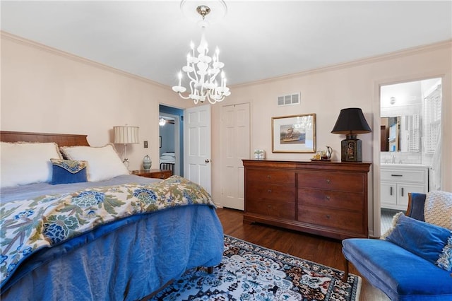 bedroom with visible vents, an inviting chandelier, wood finished floors, and ornamental molding